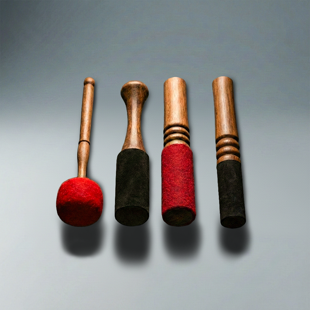 Serene Streams four handcrafted Tibetan singing bowl mallets — Moonrise, Moonlit, Crimson Sunrise, and Radiant Blossom — from Kathmandu Nepal